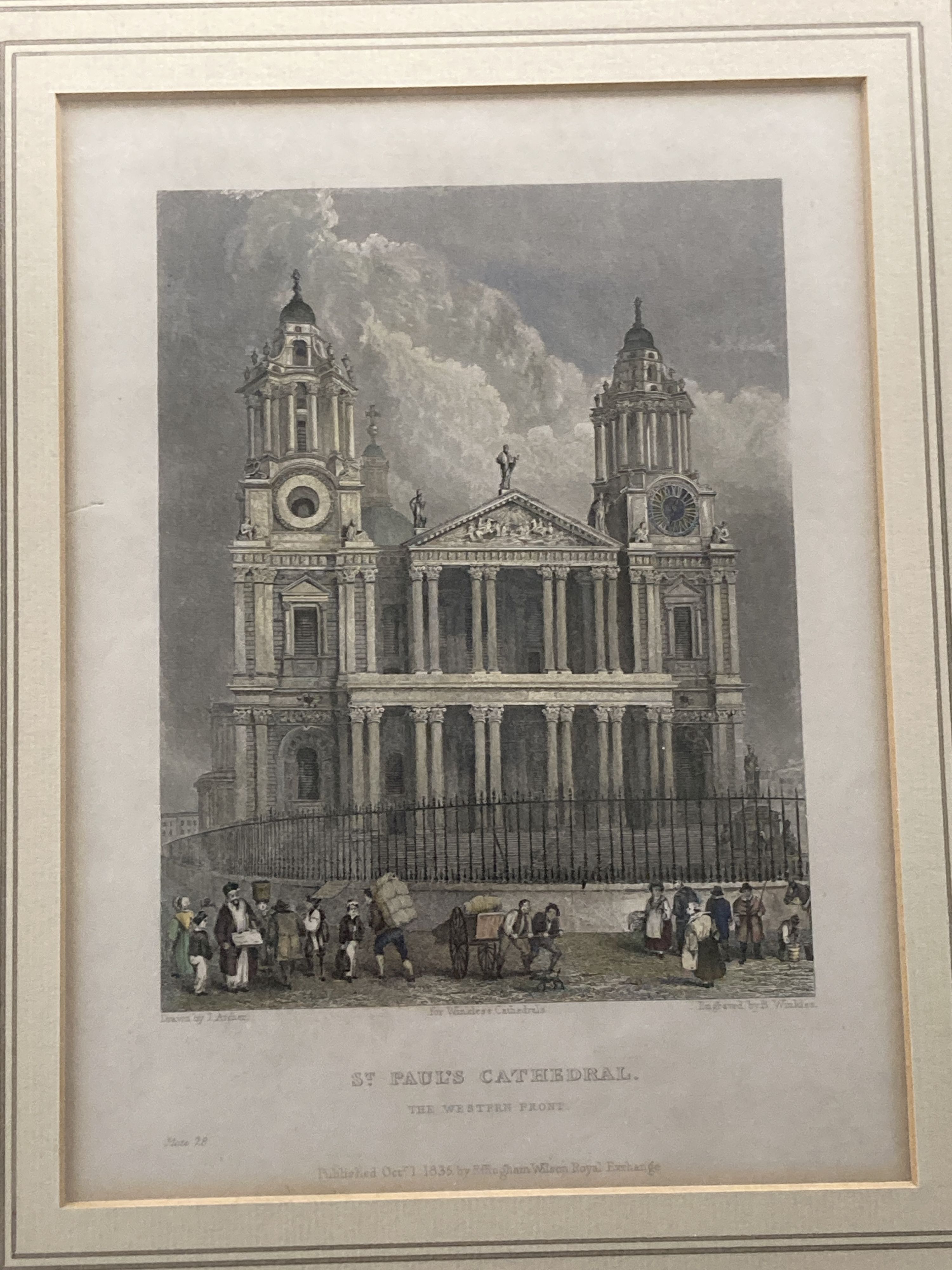 An early 20th century etching of the Rialto Bridge, Venice, indistinctly signed, 22 x 30cm and a coloured engraving of St Pauls Cathed